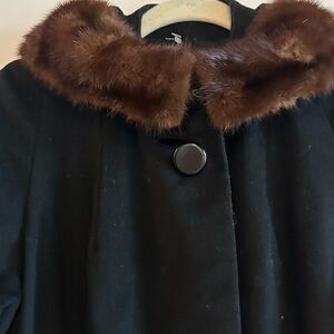 1950 -160 era cosmopolitan New York black wool coat with mink collar.